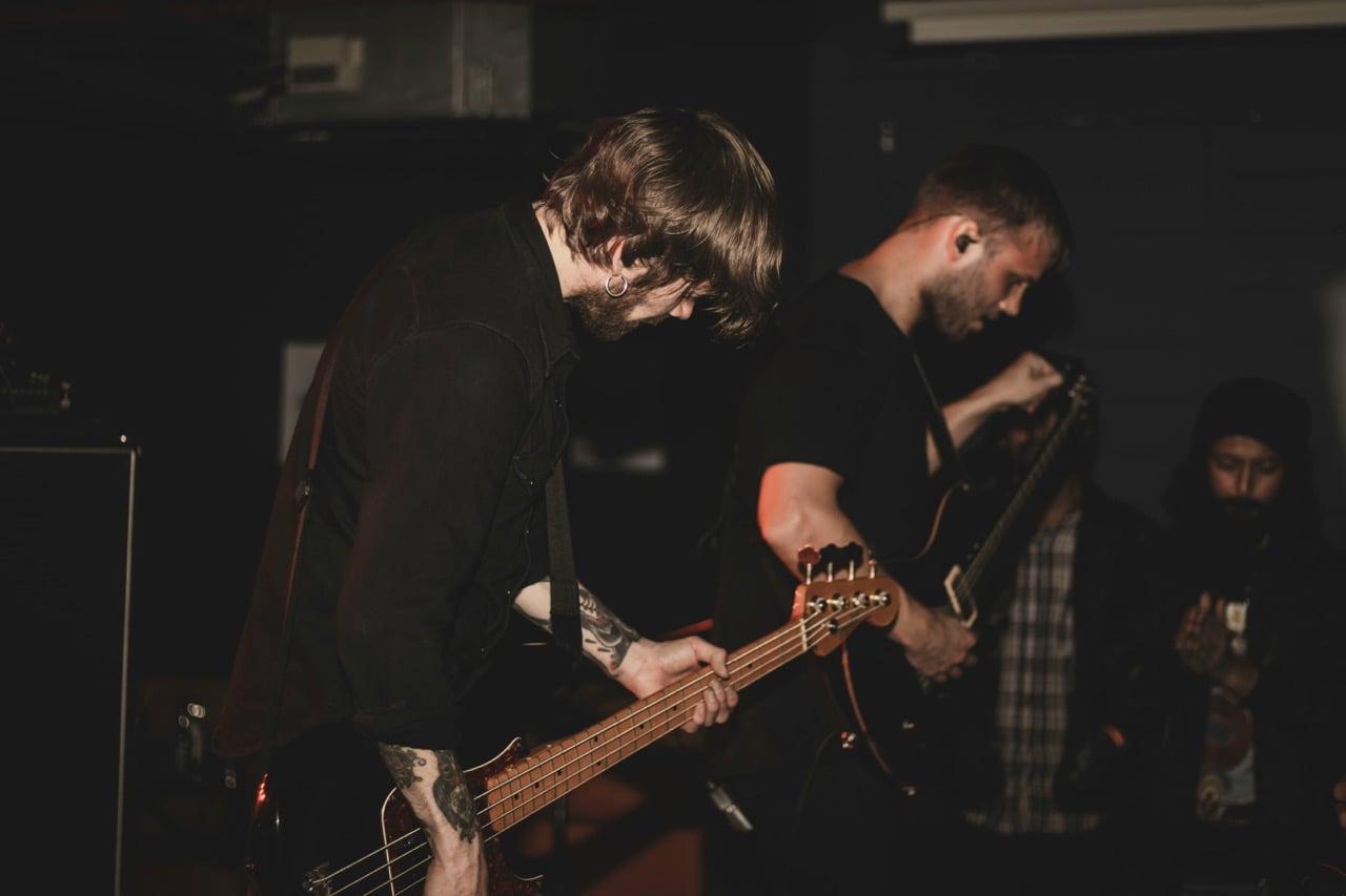 Band rehearsing in a colorful studio