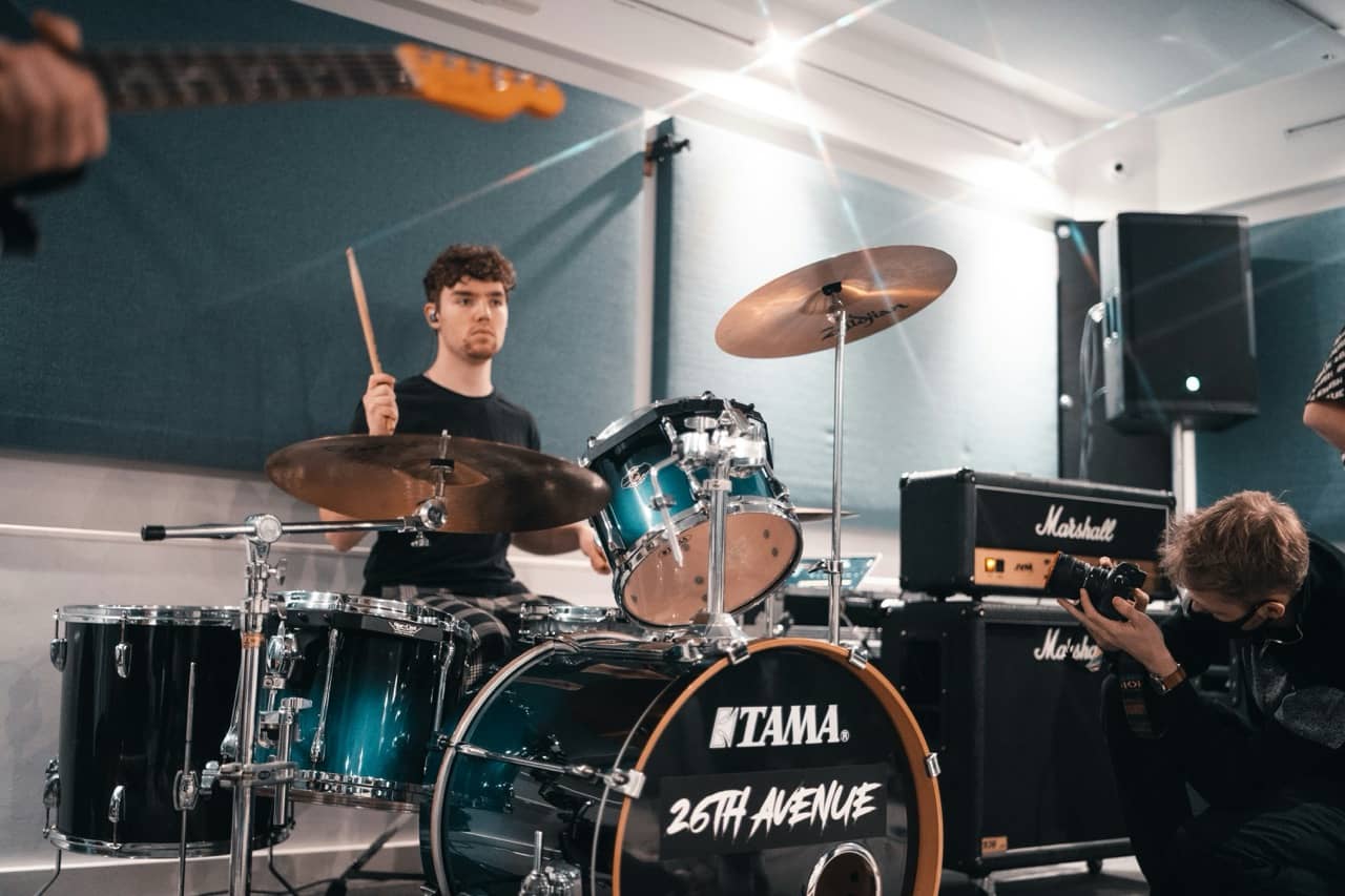 Musicians using hourly studio booking system